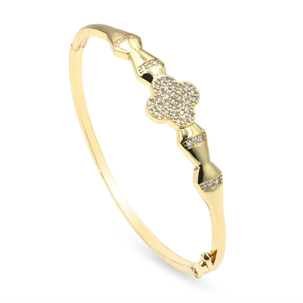 A gold bangle bracelet featuring a pavé-set four-leaf clover motif and small diamond accents, shown on a clean white background.