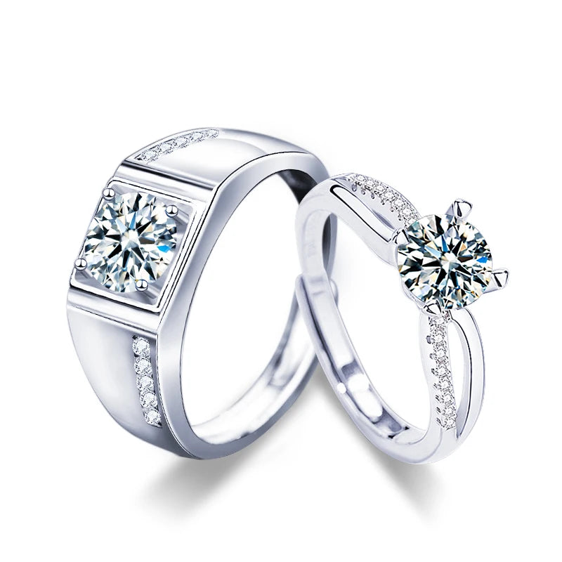 Two silver rings with diamond-like stones on a white background