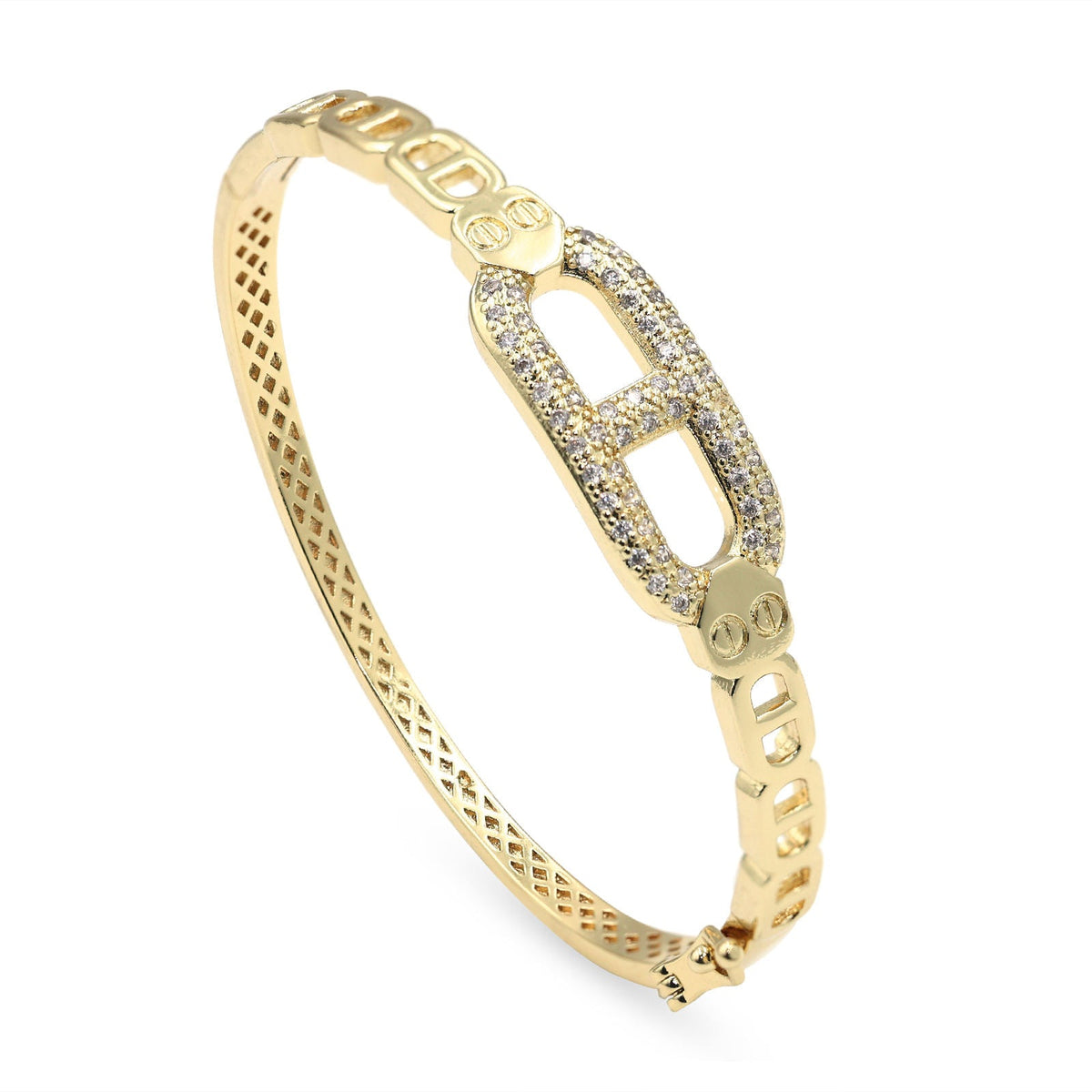 A gold hinged bangle bracelet featuring a central rectangular link pavé-set with clear stones, and small engraved monogram details on the links, shown on a plain white background.