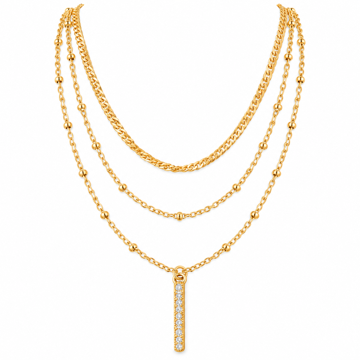 A gold multi-layer necklace featuring three distinct chain styles (curb, beaded, and delicate link) with a vertical bar pendant paved with clear stones, shown on a plain white background.