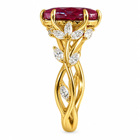A yellow gold ring featuring a large rectangular ruby gemstone at the top, with leaf-shaped diamond accents and an intertwined twisted band design below, shown on a plain white background.